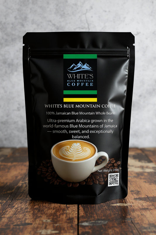 White's Blue Mountain Coffee Beans package on a wooden surface with a gray background